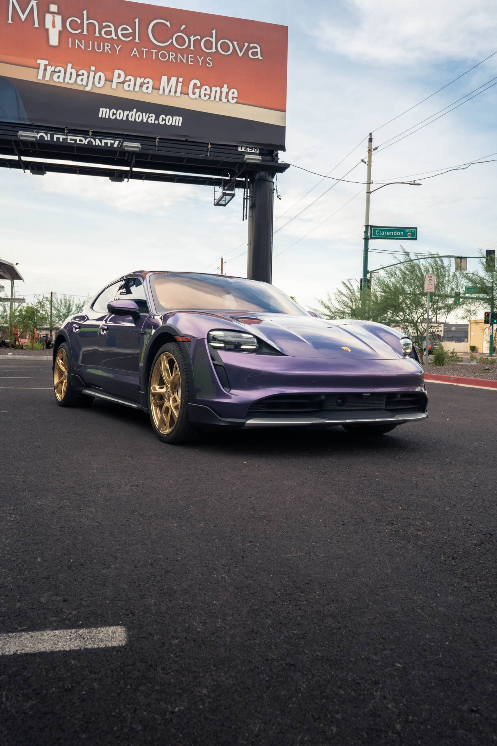 vehicle-wrap-Matte_Magic_Flame_Ruby-Gloss Porsche Taycan in the streets
